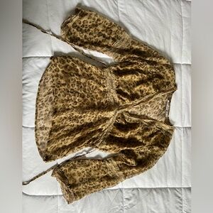 Periscope cheetah lace top